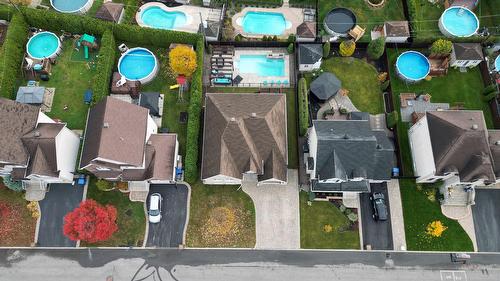 Aerial photo - 55 Rue De Lavours, Terrebonne (Terrebonne), QC - Outdoor With Above Ground Pool With View