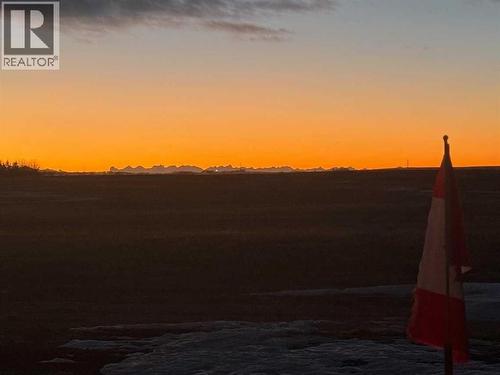 Gorgeous mountain view at sunset - 17, 1200 Milt Ford Lane, Carstairs, AB - Outdoor With View