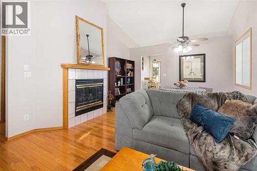 17, 1200 Milt Ford Lane, Carstairs, AB - Indoor Photo Showing Living Room With Fireplace