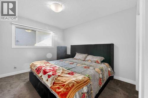 8 Malvern Crescent Ne, Calgary, AB - Indoor Photo Showing Bedroom