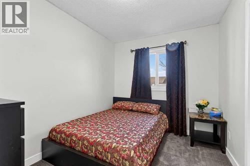 8 Malvern Crescent Ne, Calgary, AB - Indoor Photo Showing Bedroom