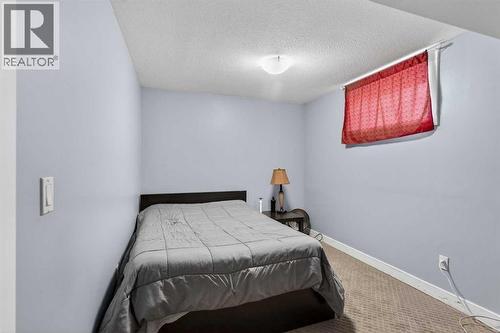 8 Malvern Crescent Ne, Calgary, AB - Indoor Photo Showing Bedroom