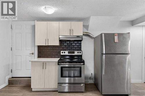 8 Malvern Crescent Ne, Calgary, AB - Indoor Photo Showing Kitchen With Stainless Steel Kitchen