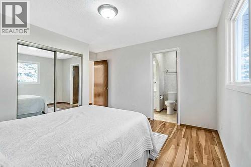 107 Lock Crescent, Okotoks, AB - Indoor Photo Showing Bedroom