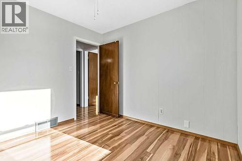 107 Lock Crescent, Okotoks, AB - Indoor Photo Showing Other Room