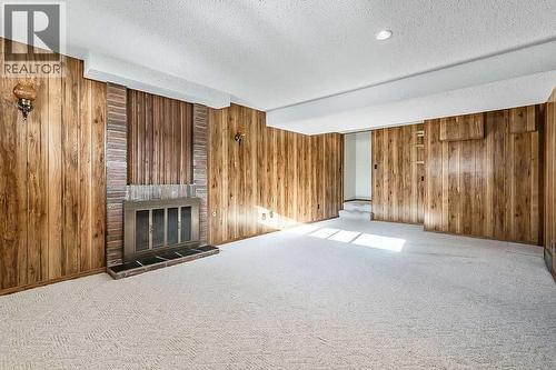 107 Lock Crescent, Okotoks, AB - Indoor Photo Showing Other Room