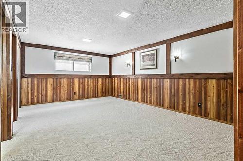 107 Lock Crescent, Okotoks, AB - Indoor Photo Showing Other Room