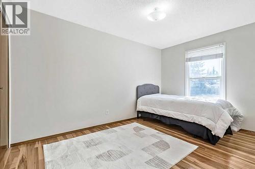 107 Lock Crescent, Okotoks, AB - Indoor Photo Showing Bedroom