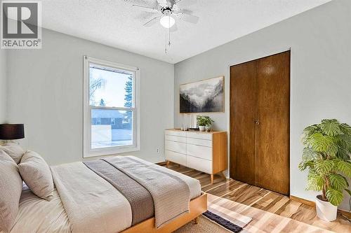 107 Lock Crescent, Okotoks, AB - Indoor Photo Showing Bedroom