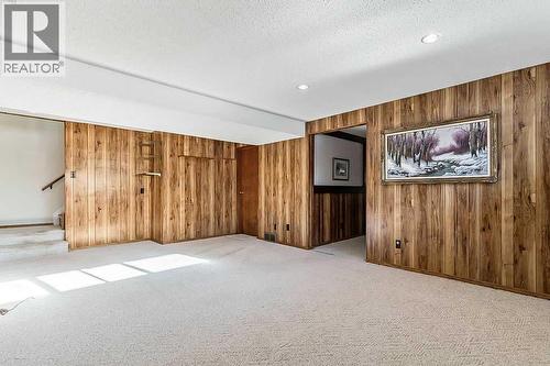 107 Lock Crescent, Okotoks, AB - Indoor Photo Showing Other Room