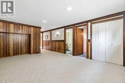 107 Lock Crescent, Okotoks, AB - Indoor Photo Showing Other Room