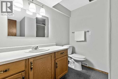 107 Lock Crescent, Okotoks, AB - Indoor Photo Showing Bathroom