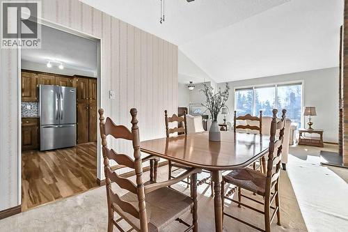 107 Lock Crescent, Okotoks, AB - Indoor Photo Showing Dining Room