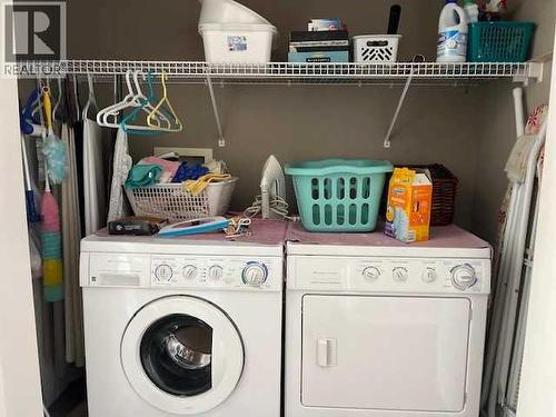 901 Nativity Bay, Rural Rocky View County, AB - Indoor Photo Showing Laundry Room