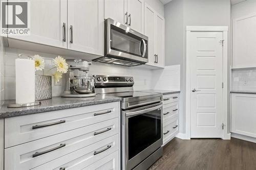 3 Sage Bluff Heights Nw, Calgary, AB - Indoor Photo Showing Kitchen With Upgraded Kitchen