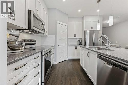 3 Sage Bluff Heights Nw, Calgary, AB - Indoor Photo Showing Kitchen With Stainless Steel Kitchen With Upgraded Kitchen