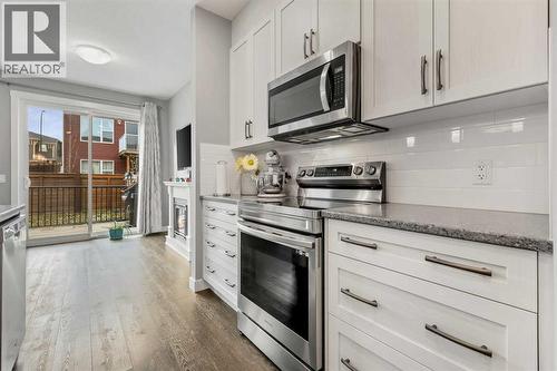 3 Sage Bluff Heights Nw, Calgary, AB - Indoor Photo Showing Kitchen