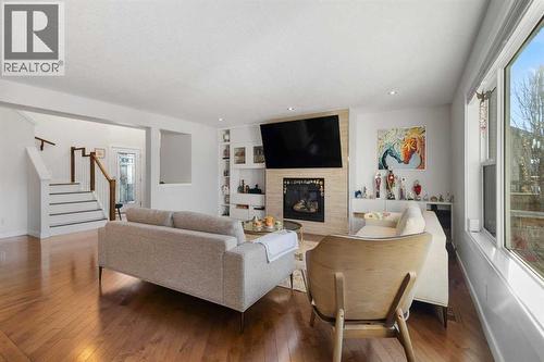 109 Copperfield Common Se, Calgary, AB - Indoor Photo Showing Living Room With Fireplace