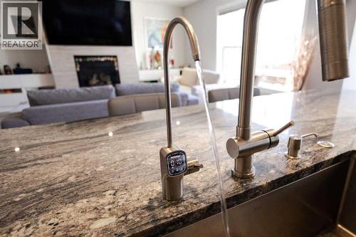 109 Copperfield Common Se, Calgary, AB - Indoor Photo Showing Other Room With Fireplace