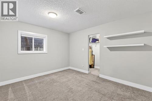 101 12A Street Ne, Calgary, AB - Indoor Photo Showing Other Room