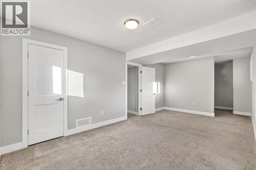 101 12A Street Ne, Calgary, AB - Indoor Photo Showing Other Room