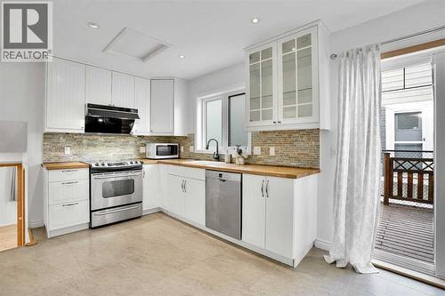 143 Millview Court Sw, Calgary, AB - Indoor Photo Showing Kitchen