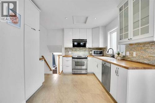 143 Millview Court Sw, Calgary, AB - Indoor Photo Showing Kitchen With Upgraded Kitchen