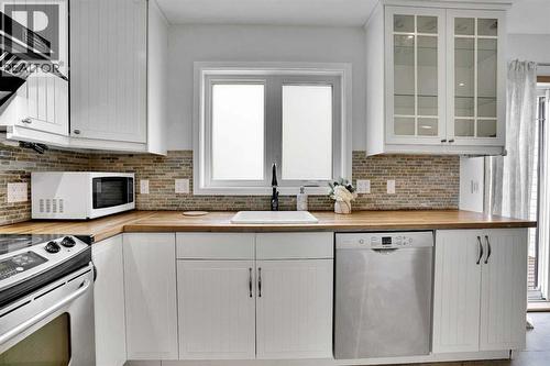 143 Millview Court Sw, Calgary, AB - Indoor Photo Showing Kitchen