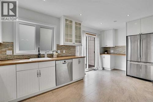 143 Millview Court Sw, Calgary, AB - Indoor Photo Showing Kitchen With Upgraded Kitchen