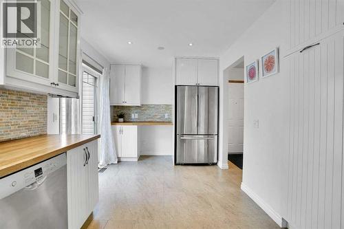 143 Millview Court Sw, Calgary, AB - Indoor Photo Showing Kitchen