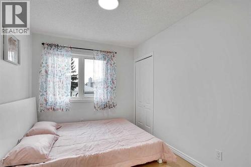 143 Millview Court Sw, Calgary, AB - Indoor Photo Showing Bedroom
