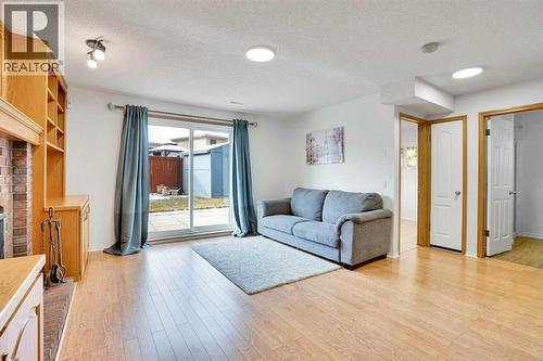 143 Millview Court Sw, Calgary, AB - Indoor Photo Showing Living Room
