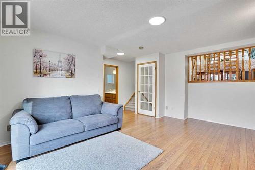 143 Millview Court Sw, Calgary, AB - Indoor Photo Showing Living Room