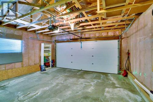 143 Millview Court Sw, Calgary, AB - Indoor Photo Showing Garage