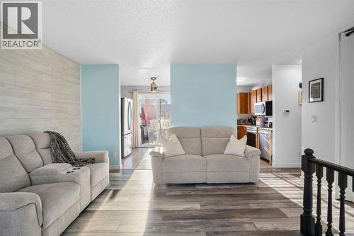 43 Applewood Drive Se, Calgary, AB - Indoor Photo Showing Living Room
