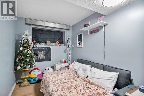 43 Applewood Drive Se, Calgary, AB - Indoor Photo Showing Bedroom