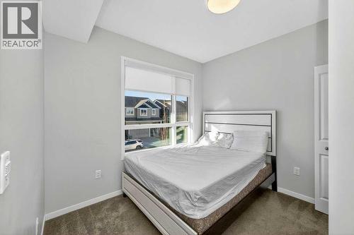1207, 33 Carringham Gate Nw, Calgary, AB - Indoor Photo Showing Bedroom