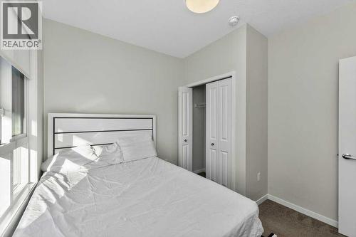 1207, 33 Carringham Gate Nw, Calgary, AB - Indoor Photo Showing Bedroom