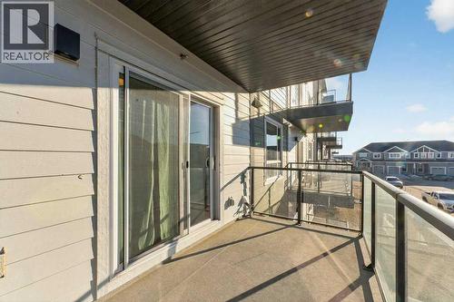 1207, 33 Carringham Gate Nw, Calgary, AB - Outdoor With Balcony With Exterior
