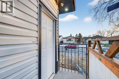 Separate side entrance to illegal suites - 420 Pinegreen Close Ne, Calgary, AB - Outdoor With Exterior