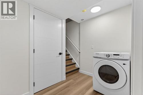 Dryer - 420 Pinegreen Close Ne, Calgary, AB - Indoor Photo Showing Laundry Room