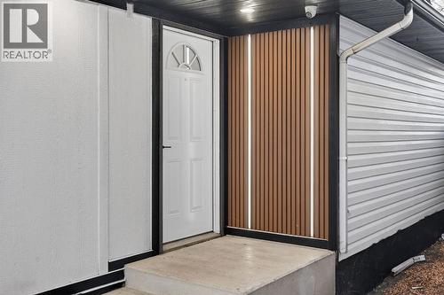 Main entrance with custom LED wall - 420 Pinegreen Close Ne, Calgary, AB - Indoor Photo Showing Other Room