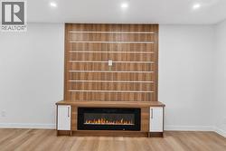 Custom multi media nook with built in electrical fireplace - 