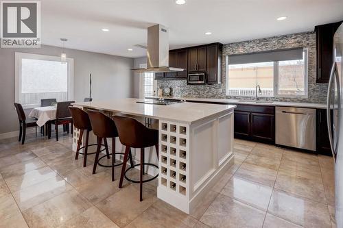 413 Albert Street Se, Airdrie, AB - Indoor Photo Showing Kitchen With Upgraded Kitchen