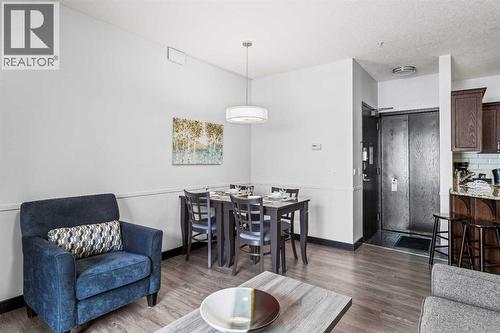 205 Rot. A, 901 Mountain Street, Canmore, AB - Indoor Photo Showing Living Room