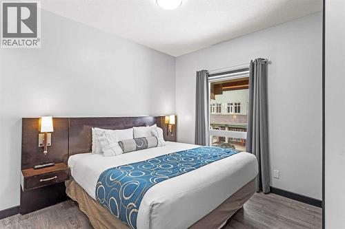 205 Rot. A, 901 Mountain Street, Canmore, AB - Indoor Photo Showing Bedroom