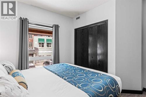 205 Rot. A, 901 Mountain Street, Canmore, AB - Indoor Photo Showing Bedroom