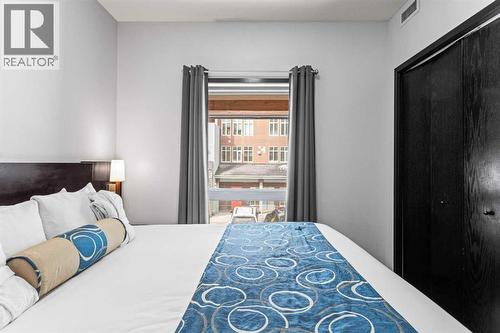 205 Rot. A, 901 Mountain Street, Canmore, AB - Indoor Photo Showing Bedroom