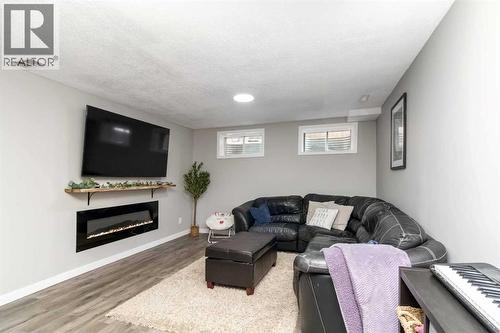 Family Room - 247 Cornwall Drive, Fort Mcmurray, AB - Indoor With Fireplace