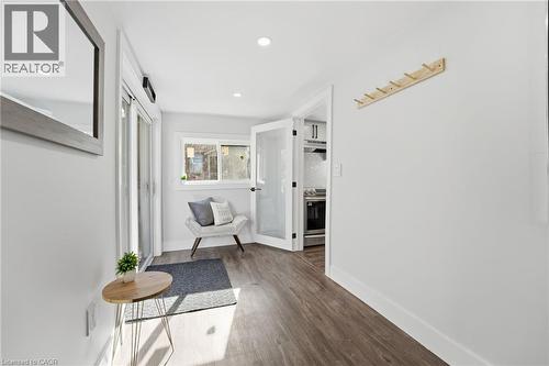 Hallway with dark wood finished floors and recessed lighting - 4255 William Street, Beamsville, ON - Indoor Photo Showing Other Room